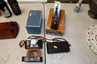 A Zeiss Icon camera, an Emi K camera with box and