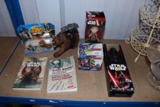 Various Star Wars figures and two books