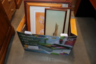 A box of miscellaneous prints including a pair of