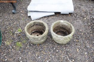 A pair concrete garden planters