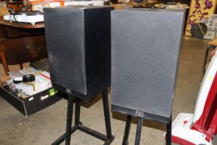A pair of vintage speakers on stands