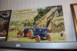 A reproduction Fordson Major advertising sign