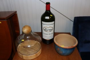 An empty Magnum bottle for Chateau Chasse-Spleen;