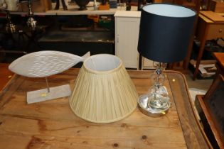 A modern design table lamp and shade, together wit