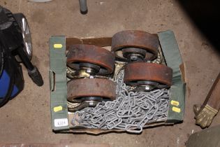 A box of chain and four heavy duty casters