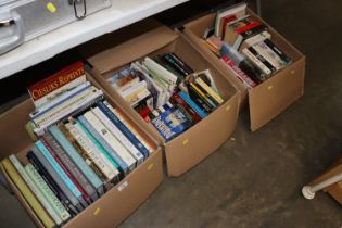 A box of books relating to antique dolls houses an