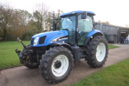 New Holland TS125A 4WD tractor. Registration AU04 ECC. Date of first registration 01/03/2004. 5,