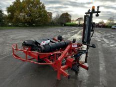 Lawrence Edward Supa-Pac remote control and automatic static linkage mounted hydraulic driven bale