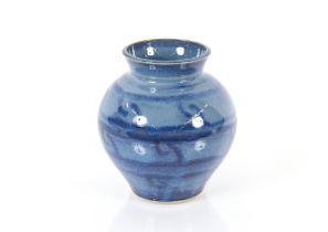 A blue glazed Studio pottery baluster vase, impres
