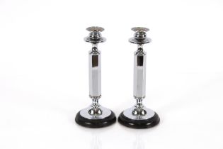 A pair of Art Deco black and chrome candlesticks,