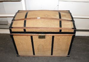 A canvas and battened dome topped travelling trunk