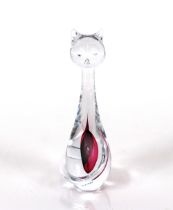 An Artcristal Bohemia Blue Praha glass model of a seated stylised cat with encased ruby coloured