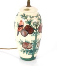 A Moorcroft pottery table lamp , with bird and fru