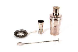A plated cocktail set comprising shaker, strainer,