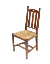 A set of four early 20th Century oak dining chairs