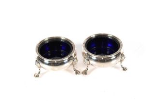A pair of Tiffany & Co. salt cellars with beaded e