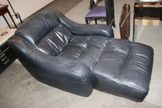 A large modern design black leather upholstered lo