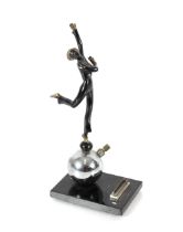 An Art Deco chrome and spelter table lighter in th