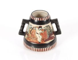 A Cibour Pottery Basque mug, decorated with a figu