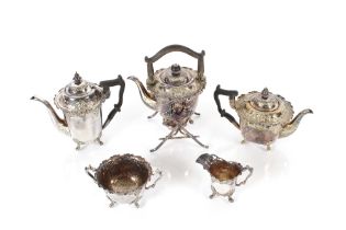 A plated five piece tea set with floral scroll dec