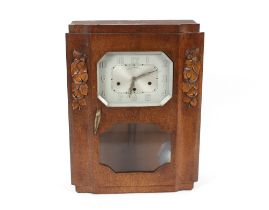 An Art Deco "Veritable" oak cased chiming wall clock, 60cm