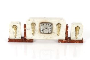 An Art Deco three piece marble clock garniture set