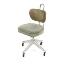 A retro metal and upholstered swivel typist chair