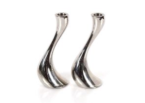 A pair of Georg Jensen candlesticks of shaped form