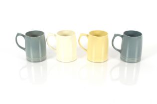 Four various Keith Murray Wedgwood mugs