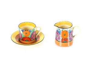 A Clarice Cliff "Gay Day" pattern coffee cup and s