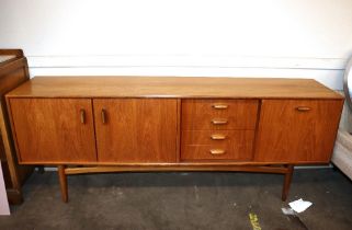 A teak G-plan design long sideboard, fitted double