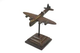 A stylised model brass casting of a 