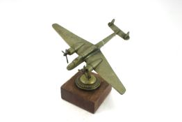 A brass cast model of a Hampden bomber displayed o