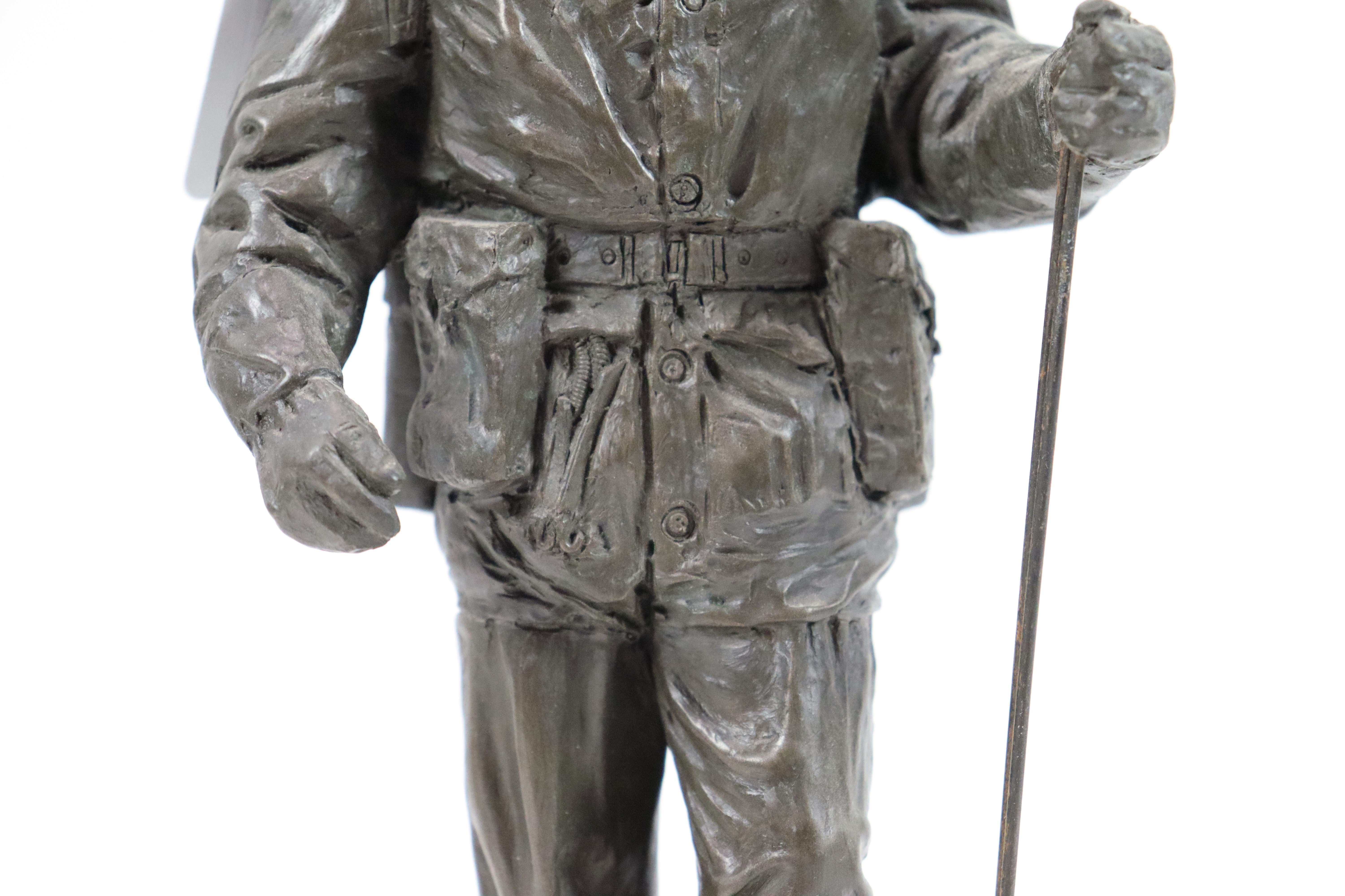 A bronzed resin figure of a soldier with his S.L.R. - Image 4 of 16