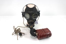 A WWII respirator (dated 6/6/42) together with a p