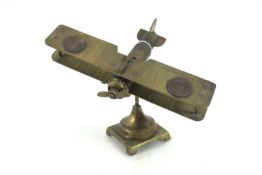A "Trench Art" model of a Bi-plane, the fuselage m