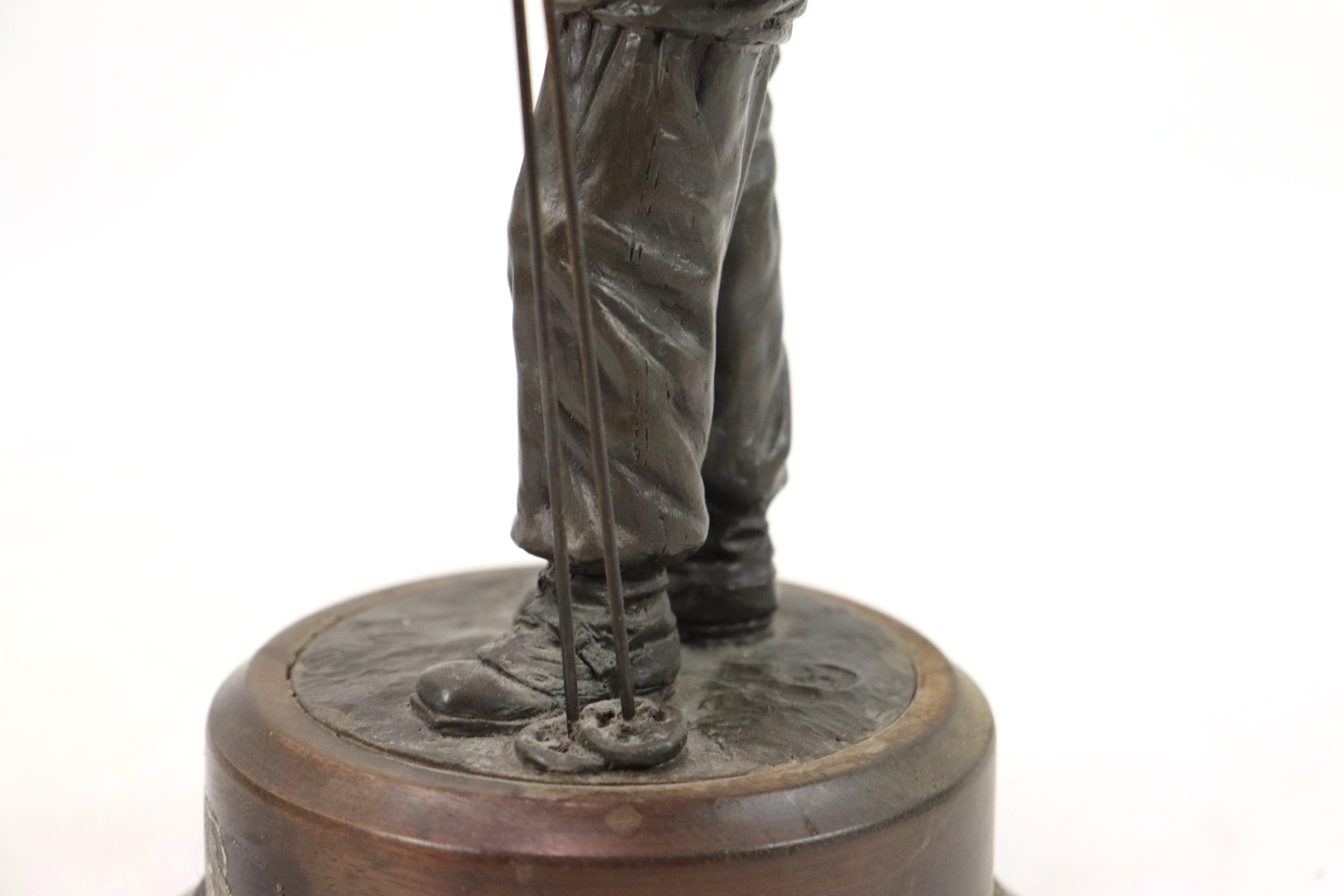 A bronzed resin figure of a soldier with his S.L.R. - Image 7 of 16