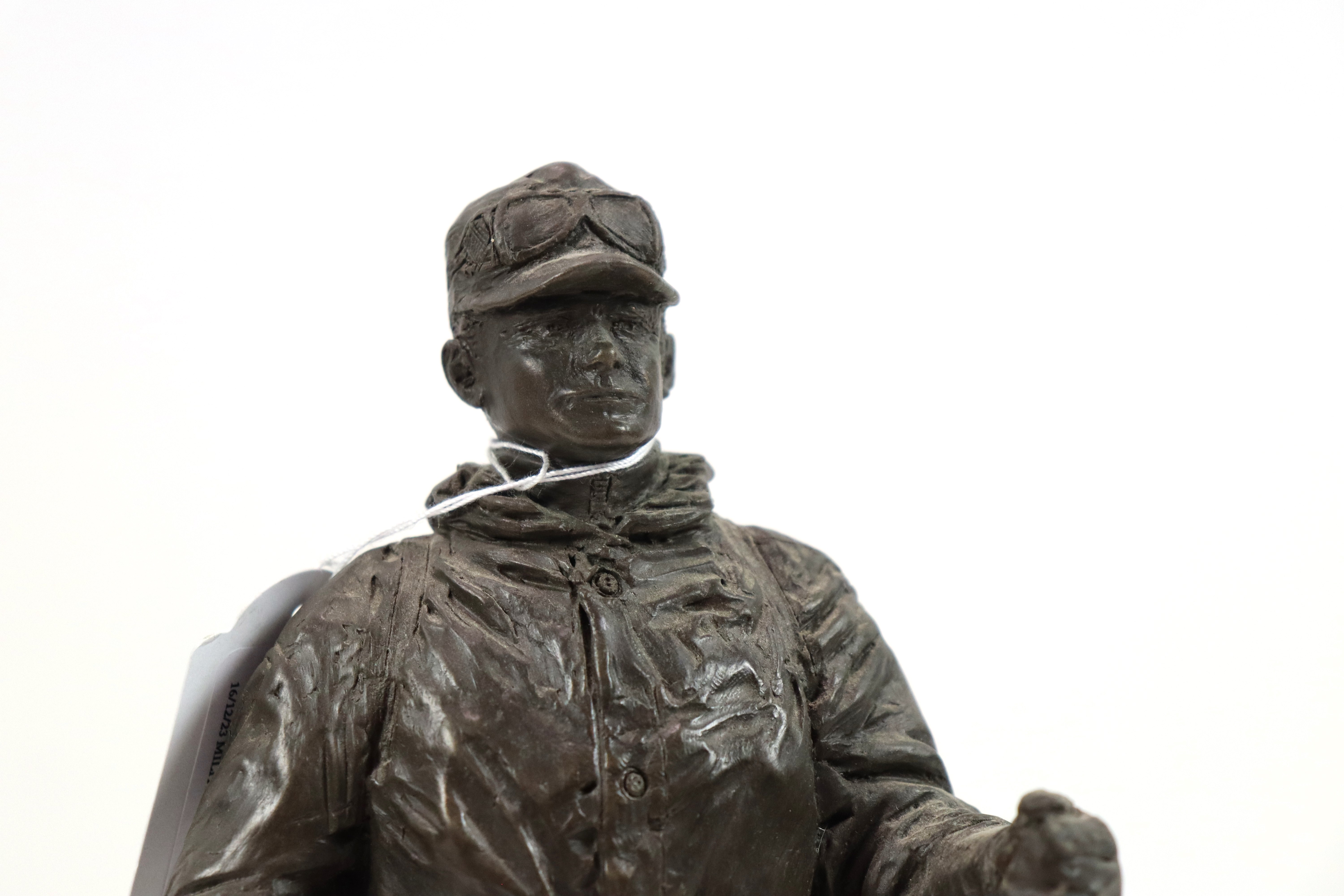 A bronzed resin figure of a soldier with his S.L.R. - Image 6 of 16