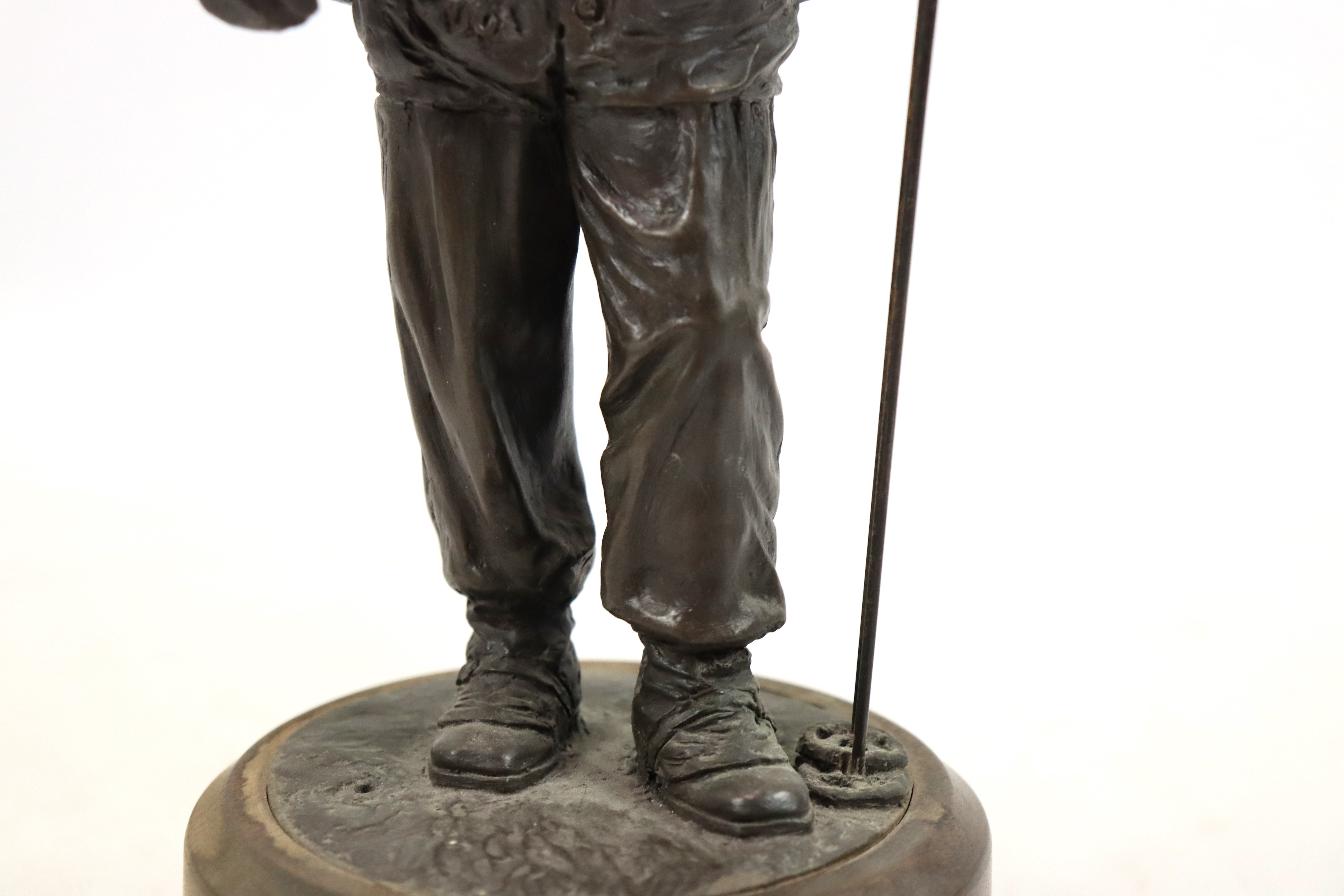 A bronzed resin figure of a soldier with his S.L.R. - Image 3 of 16