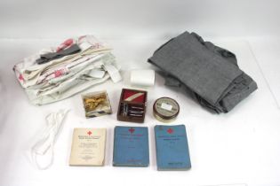 A WWI nursing related lot including dresses, apron