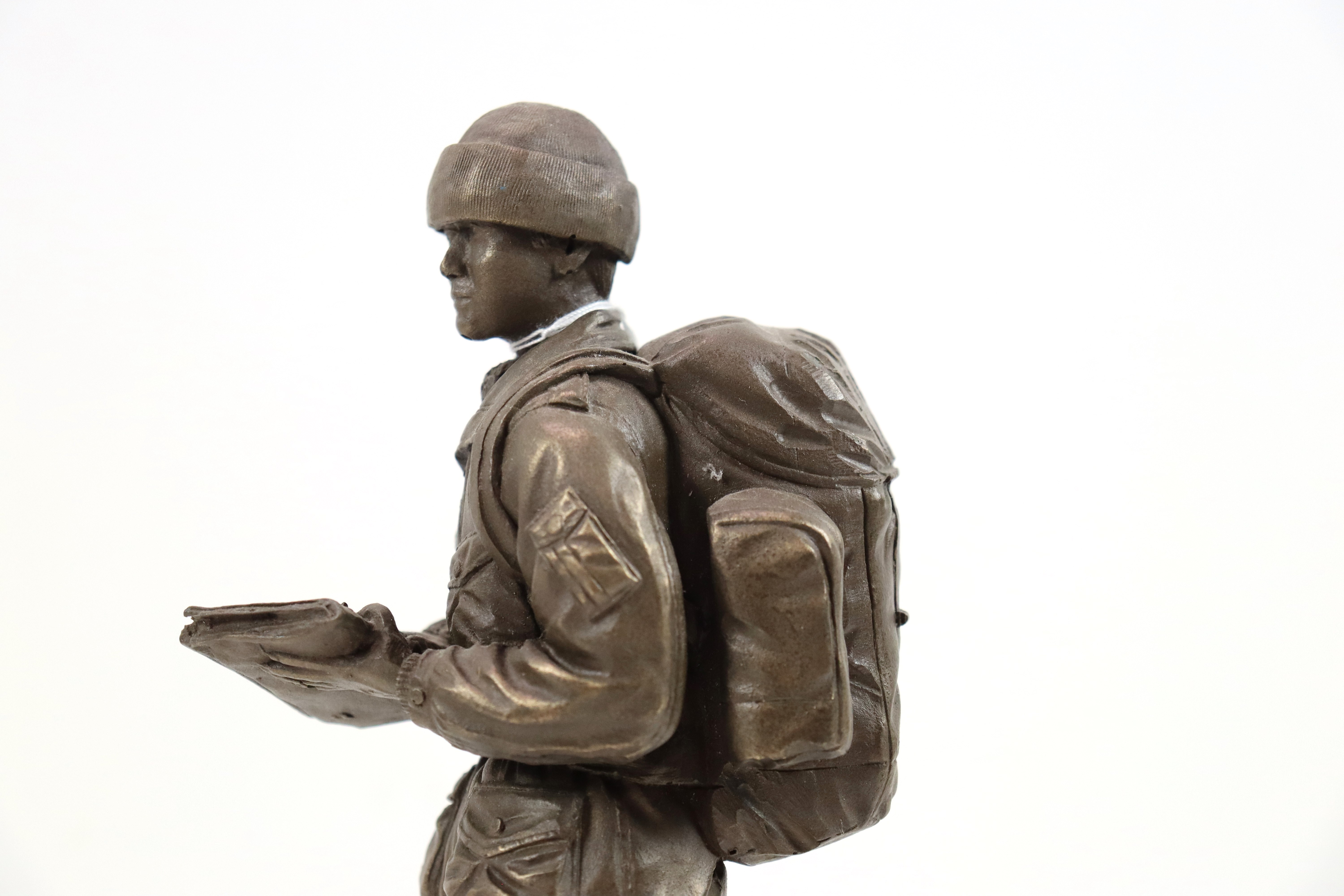 A bronzed resin figure of soldier on plinth with a - Image 8 of 15