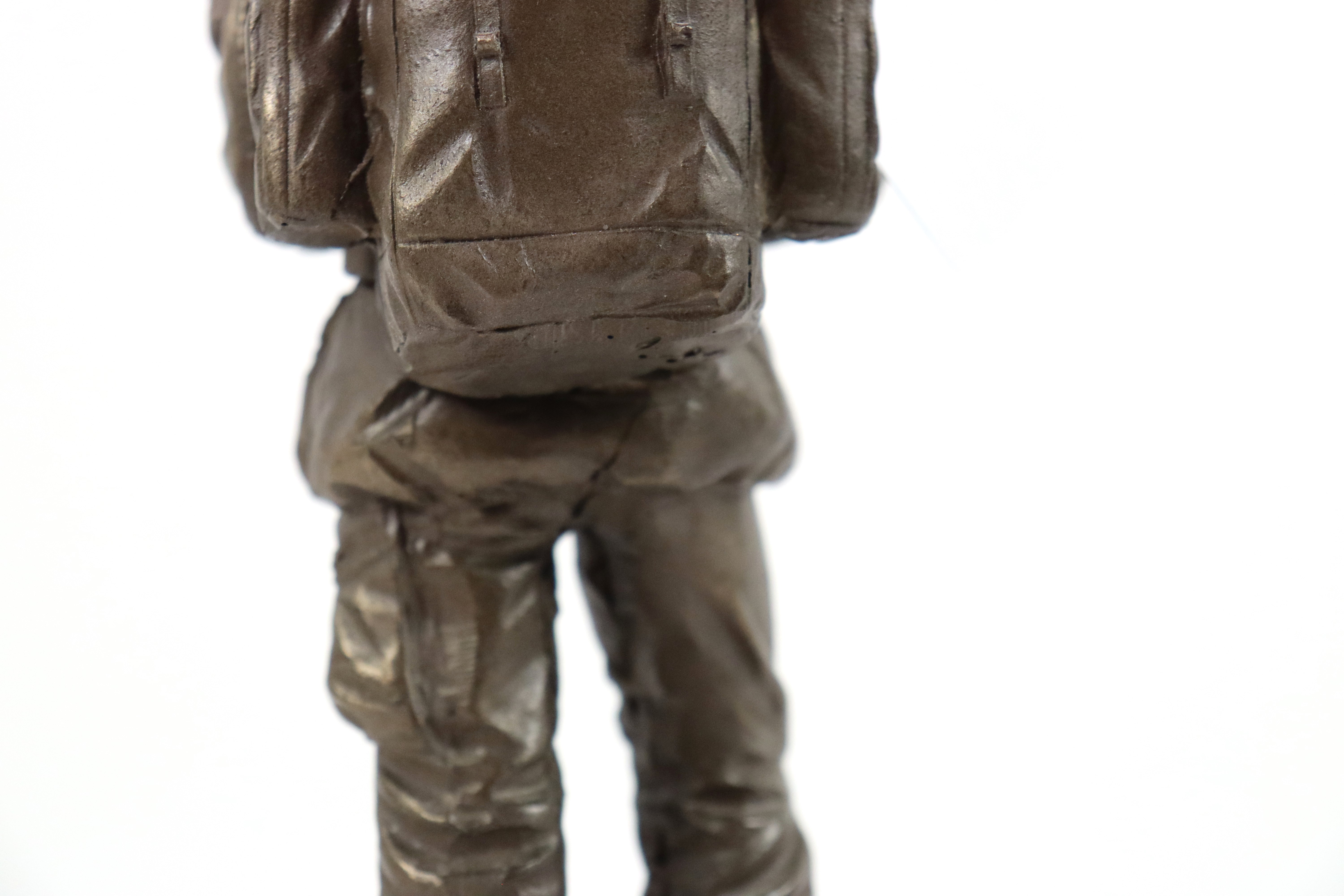 A bronzed resin figure of soldier on plinth with a - Image 11 of 15