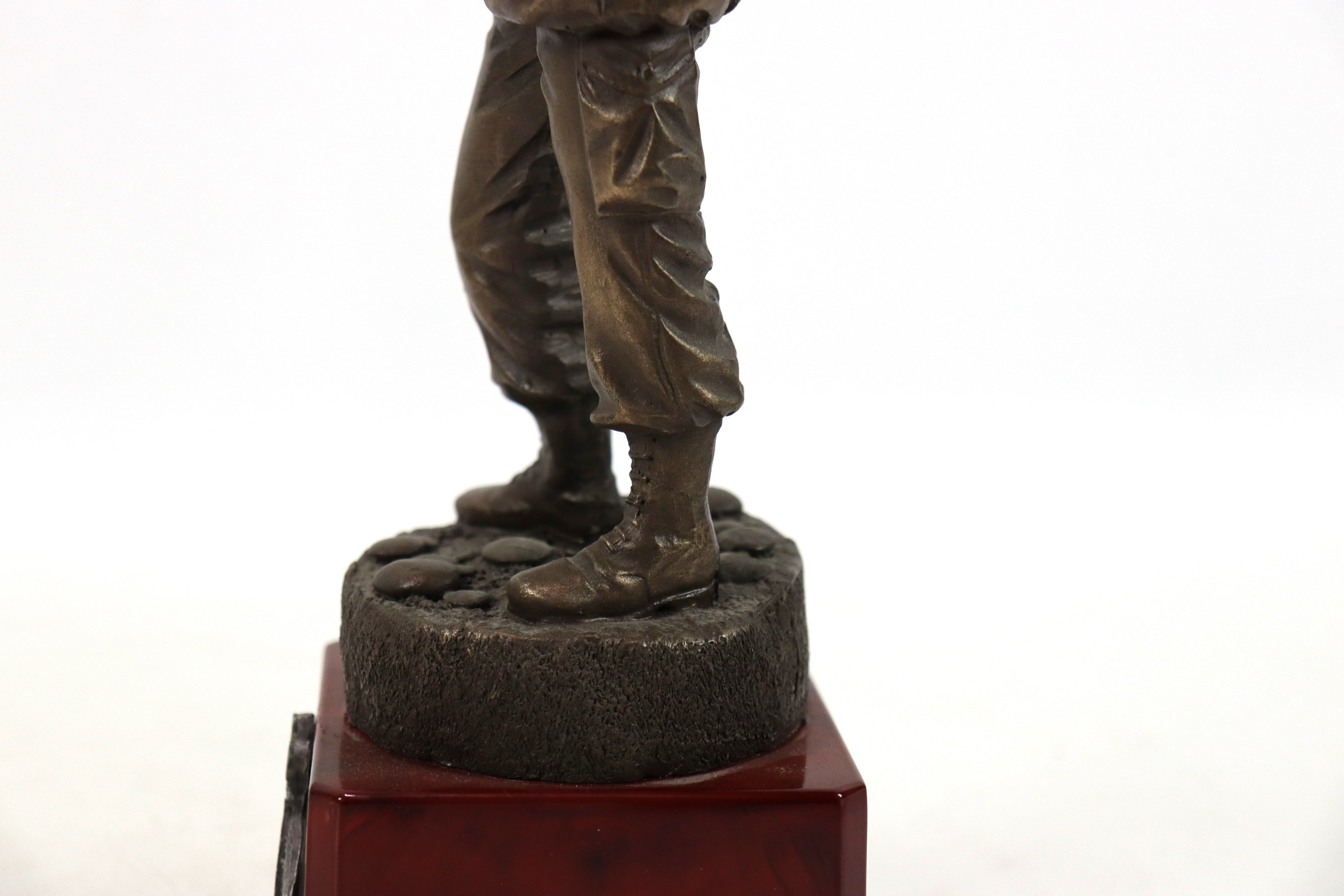 A bronzed resin figure of soldier on plinth with a - Image 9 of 15