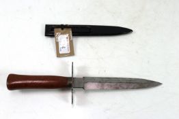 A French WWI era fighting knife with correct scabb
