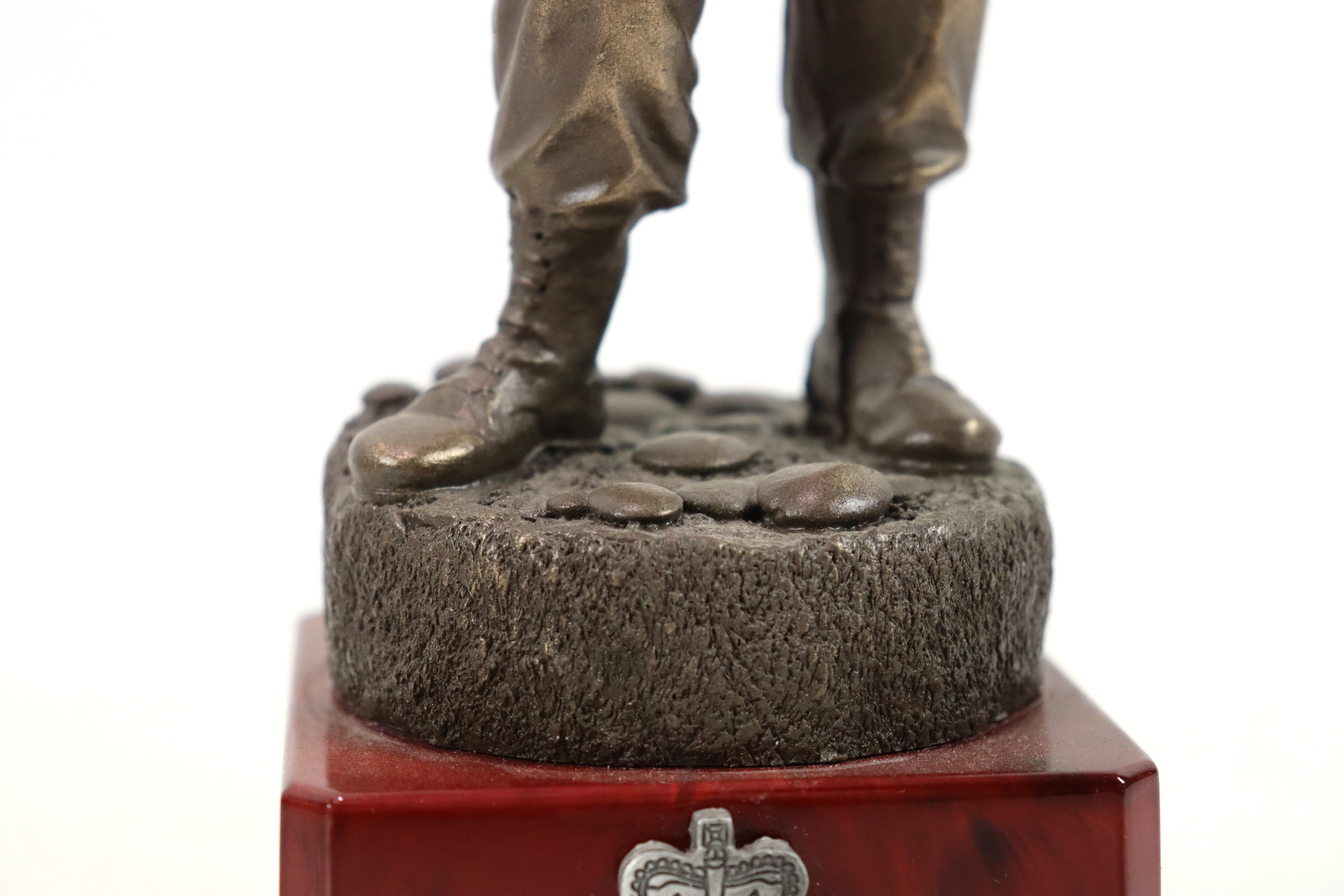 A bronzed resin figure of soldier on plinth with a - Image 3 of 15