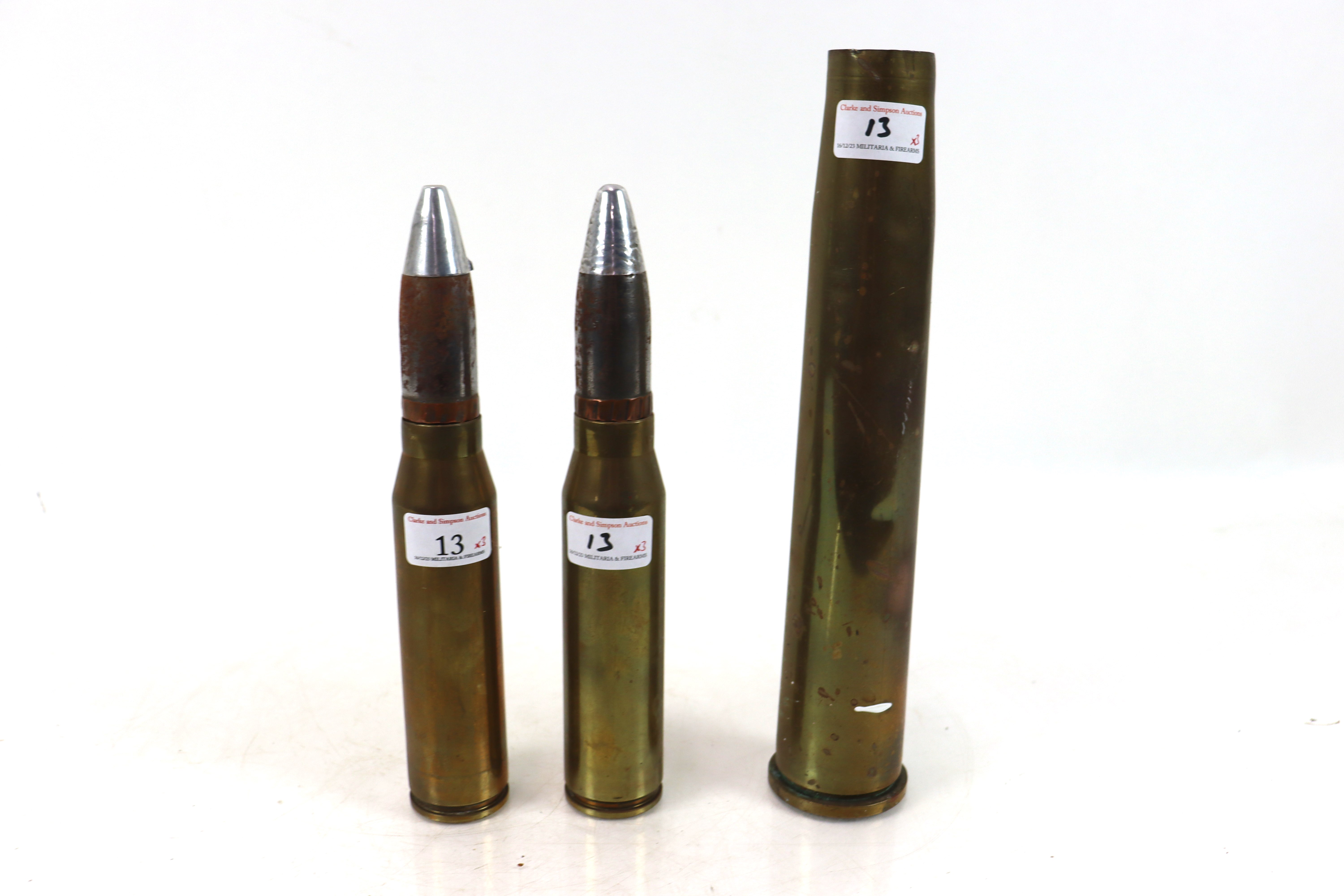 Two 30mm shell cases with heads, and a 40mm Bofers