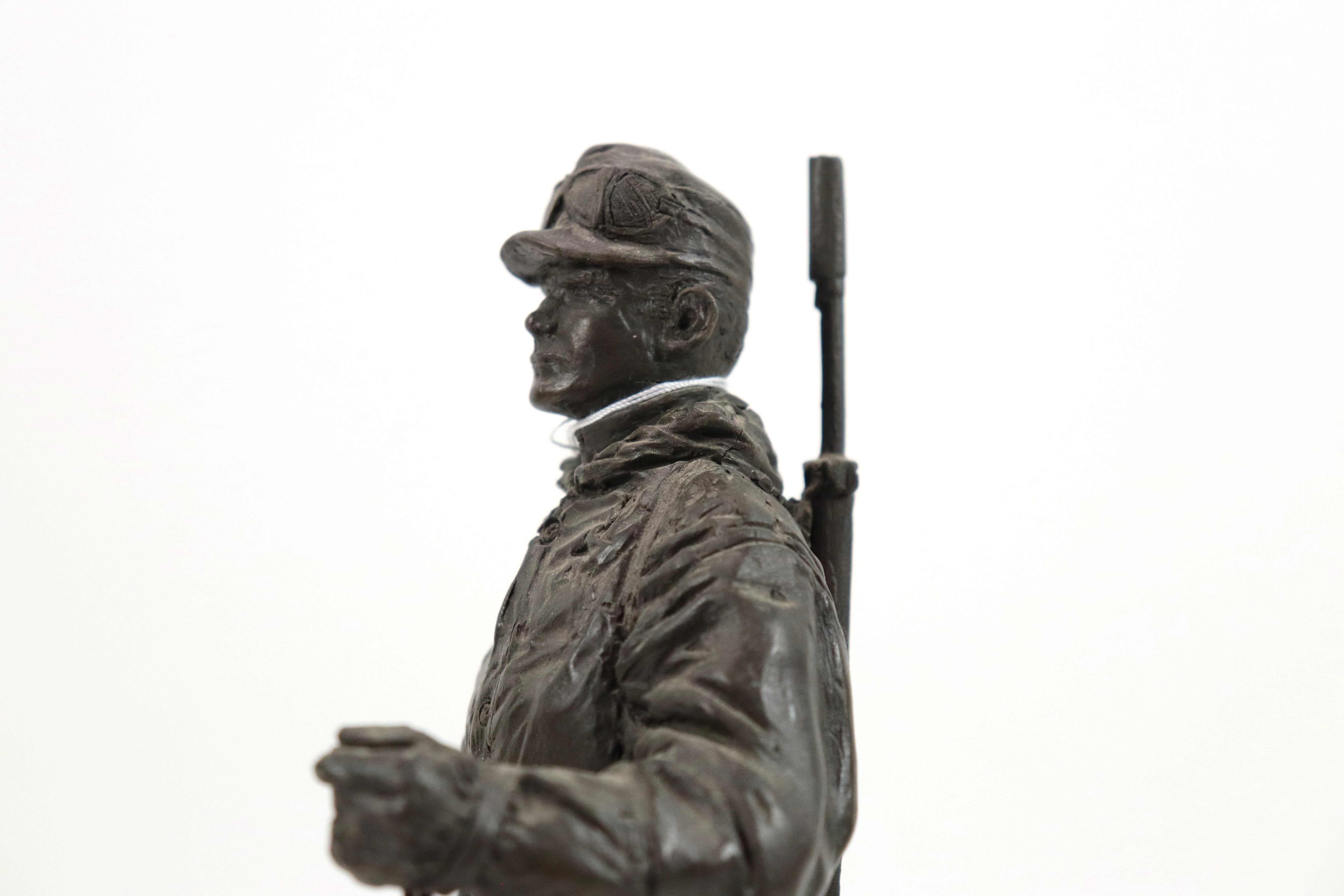 A bronzed resin figure of a soldier with his S.L.R. - Image 9 of 16