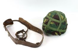 A British Kevlar helmet (dated 1984) with a vintag