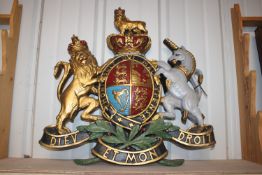 A cast plaster and hand painted British Royal coat of arms wall plaque, approx. 28" high