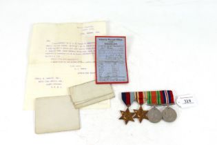 A group of four WWII medals, including 39/45 Star